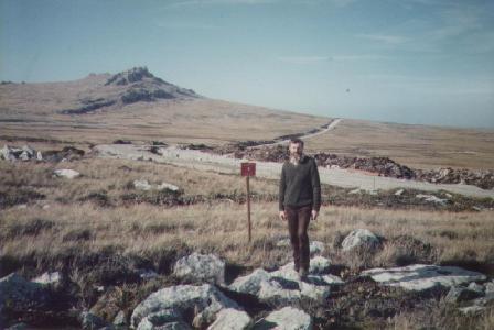 John Burrough next to a minefield warning sign west of Mount Challenger in the Falkland Islands on 19th April 1985